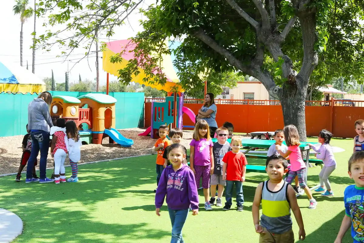 Children practicing mindful movement and breathing exercises in Sierra Preschool's yoga and mindfulness enrichment