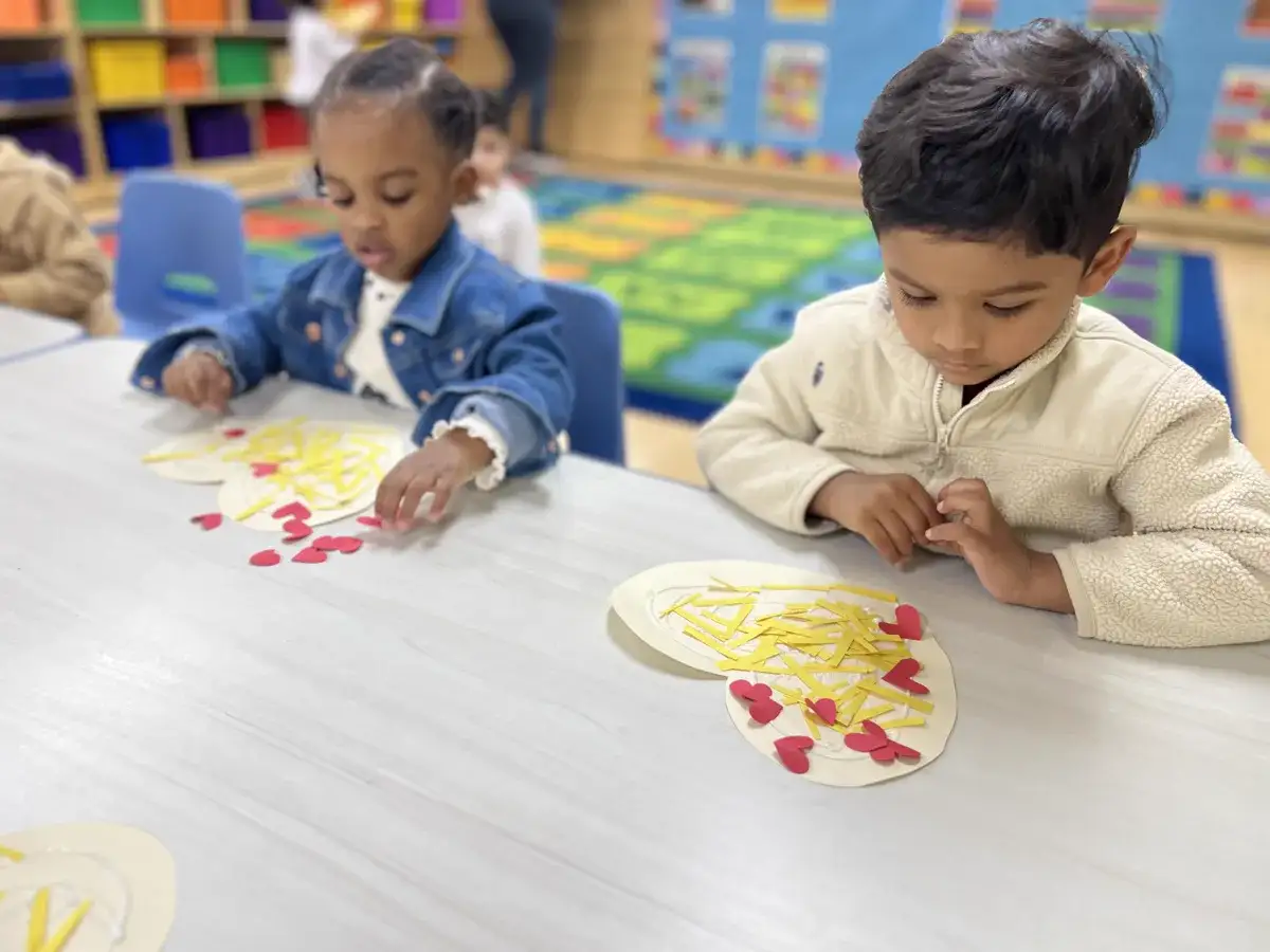 Toddlers at Sierra Preschool ages 18-30 months engaged in creative play-based learning exploration