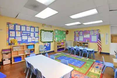 Children engaged in hands-on theme-based learning activities at Sierra Preschool